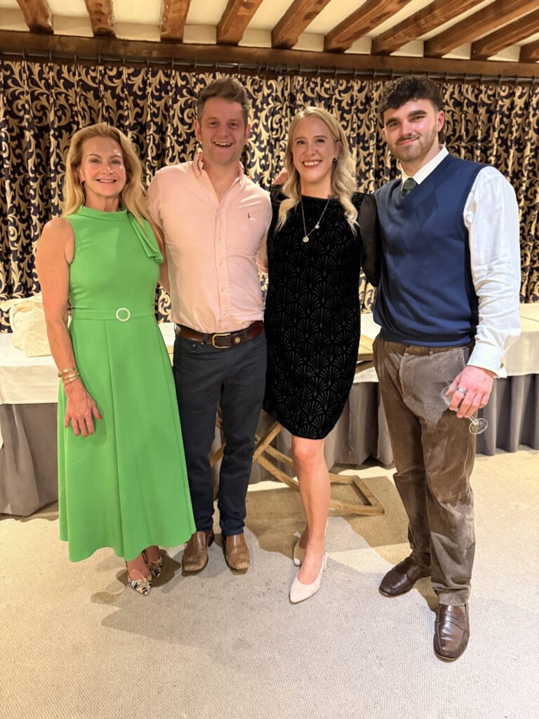 Caroline and Tom from BBC's Race Across the World, standing with Ellen Widdup and her partner Adam