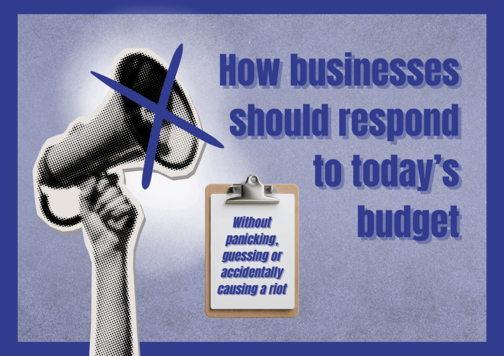 Hand holding up a megaphone